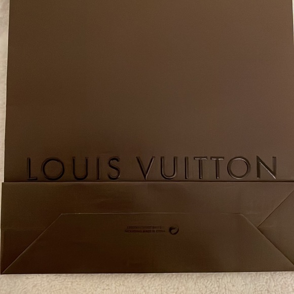 Louis Vuitton authentic gift bag measures approx. 8x 11 inches. Never opened. - Picture 5 of 6